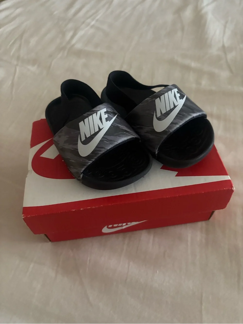 Nike Kids Black Slide Sandals with White Logo
